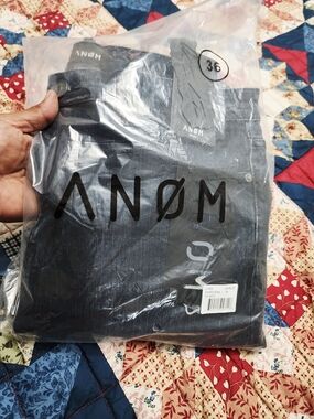 ANØM Black Jeans - Packaged